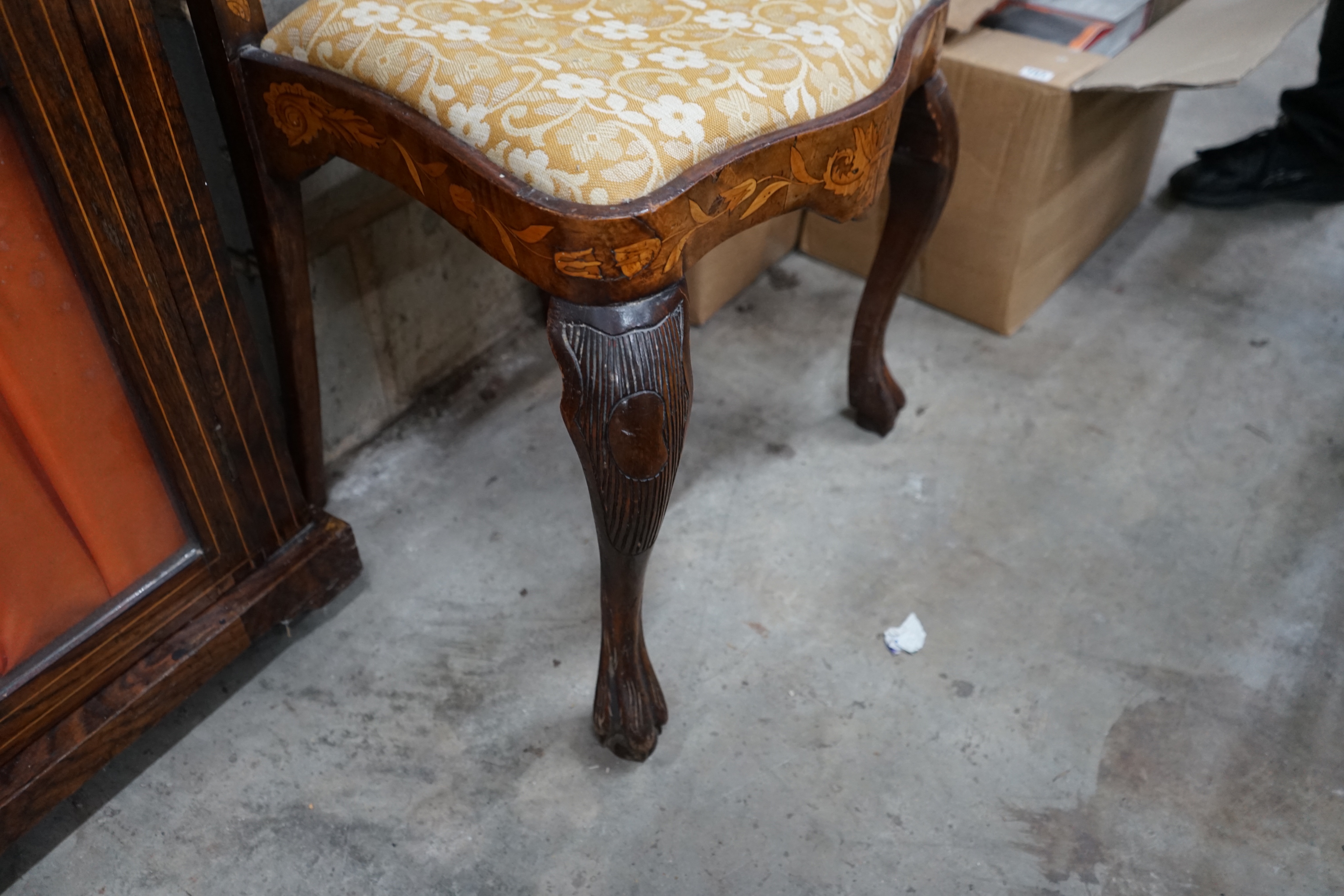 An early 18th century Dutch walnut and floral marquetry dining chair